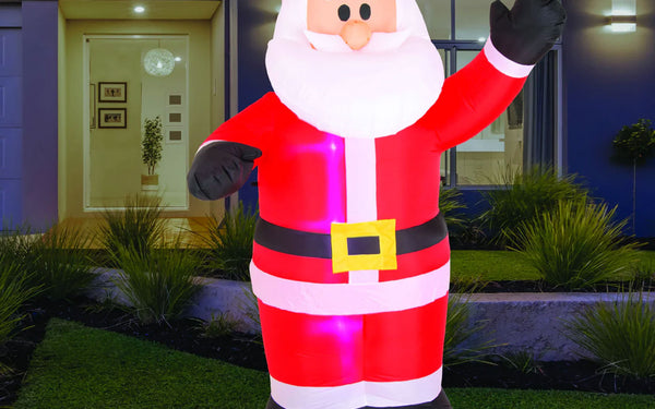 Inflatable Christmas decoration set up on a front lawn