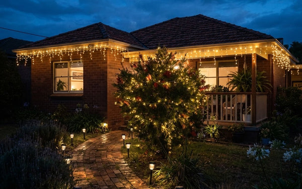 Solar Christmas lights illuminating an Australian front yard at twilight