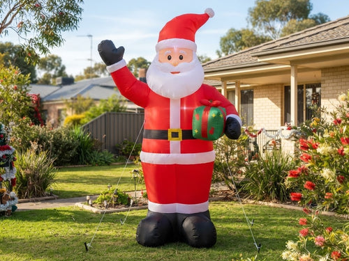 Giant inflatable Santa Christmas decoration in a front yard
