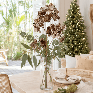 Champagne Flower Cluster 4 Head Stem arranged in a glass vase