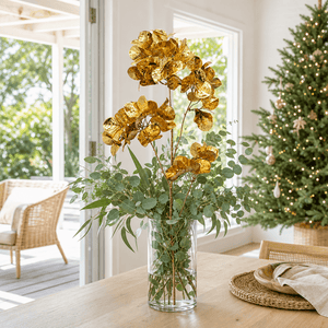 Gold Flower Cluster 4 Head Stem arranged in a glass vase