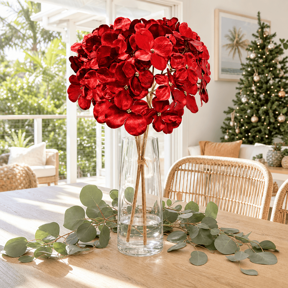 Red Metallic Flower Bouquet Stem arranged in a glass vase