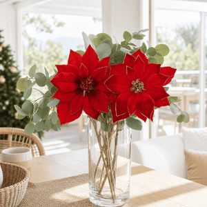 Deep Red Poinsettia Stem arranged in a glass vase
