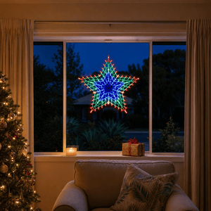LED Retro Star Light RGB (50cm) glowing in a living room window at night