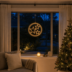 LED Double Rings Stars Twinkling Motif (52cm) glowing in a living room window at night