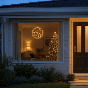 LED Double Rings Stars Twinkling Motif (52cm) hanging in a front window at night