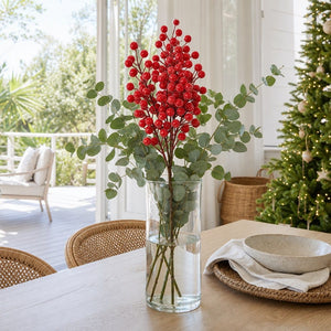 Red Flocked Berry Branch arranged in a glass vase