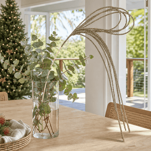 Pastel Champagne Draping Stem arranged in a glass vase