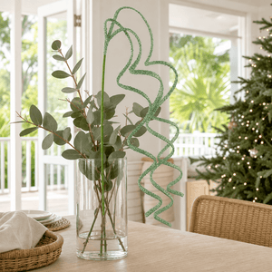 Sage Curly Draping Spray arranged in a glass vase