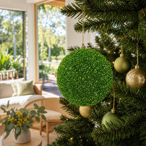 Green Glitter and Sequins Bauble on a decorated Christmas tree