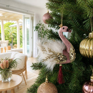 Dusty Rose Swan Ornament on a decorated Christmas tree
