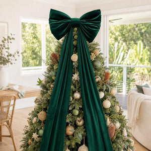 Giant Green Velvet Bow on a decorated Christmas tree