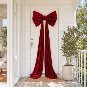 Giant Red Velvet Bow on a front door, styled in an Australian Christmas setting