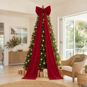 Giant Red Velvet Bow on a decorated Christmas tree, its tails running the full 240cm to the floor