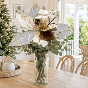 Champagne Starlight Sheer Poinsettia Stem arranged in a glass vase