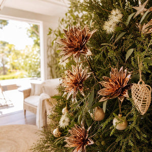 Copper Metallic Double-Head Floral Stem on a decorated Christmas tree