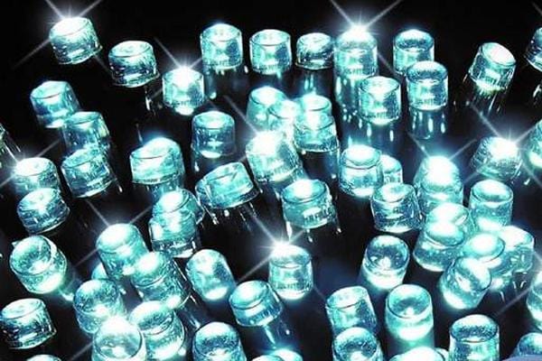 Warm white LED Christmas lights glowing indoors