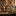 Christmas wreath and matching garland with baubles and gold ribbon