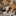 Miniature Christmas village caroler figurines in the snow