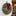 Traditional Christmas wreath with berries and bow on a front door