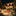 Large illuminated outdoor Christmas ornaments and reindeer at night