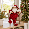 Musical Moving Santa in Armchair