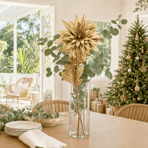 Gold Spiky Metallic Flower Stem arranged in a glass vase