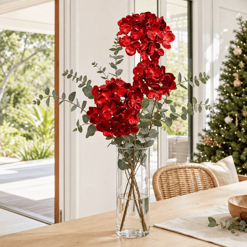 Red Triple-Head Floral Stem arranged in a glass vase