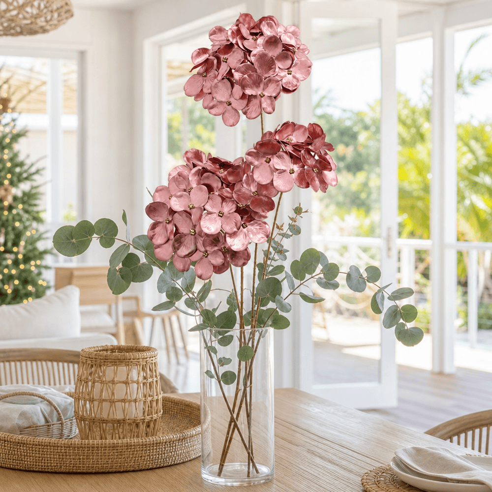 Pink Triple-Head Floral Stem arranged in a glass vase