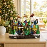LED Village with Flying Sleigh styled in an Australian Christmas setting