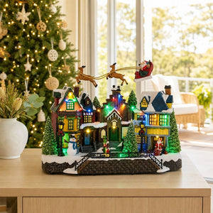 LED Village with Flying Sleigh styled in an Australian Christmas setting