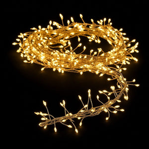 LED 100 Battery Operated Silver Wire Cluster Warm White (1m) lit up in the dark