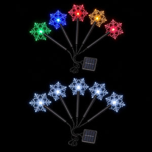 LED Solar Snowflake Path Lights 5pk (36cm) lit up in the dark