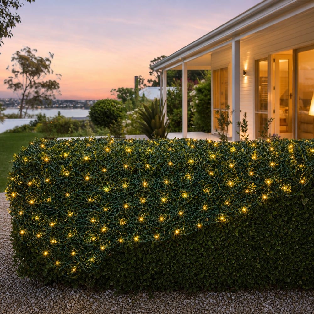 LED Warm White Net Light (2.4m) styled in an Australian Christmas setting