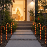 LED Battery Operated Candy Cane Path Lights 6pk lit up in an Australian Christmas setting