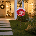 LED Battery Operated Santa Please Stop Here Stake lit up in an Australian Christmas setting