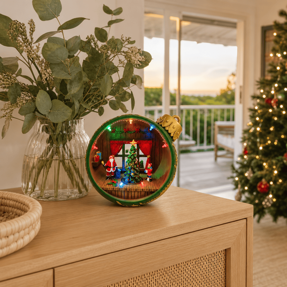 LED Musical Green Christmas Bauble Scene styled in an Australian Christmas setting