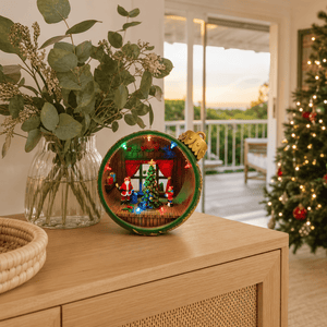 LED Musical Green Christmas Bauble Scene styled in an Australian Christmas setting