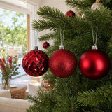 Mulberry Red Shatterproof Baubles 4pk on a decorated Christmas tree