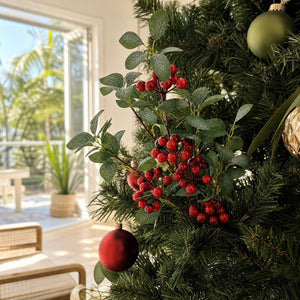 Leafy Red Berry Pick on a decorated Christmas tree
