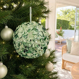 Green Sequins Bauble on a decorated Christmas tree