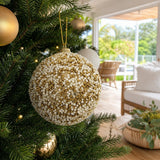 White Gold Beaded Bauble on a decorated Christmas tree