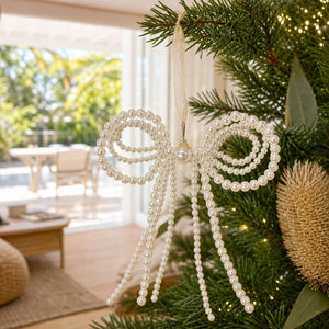 Pearl Bow Ornament on a decorated Christmas tree