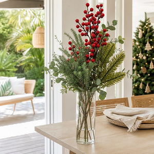 Berry and Pine Frosted Spray arranged in a glass vase