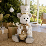 Sitting Little Drummer Bear styled in an Australian Christmas setting