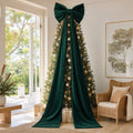 Giant Green Velvet Bow on a decorated Christmas tree, its tails running the full 240cm to the floor