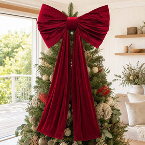 Giant Red Velvet Bow on a decorated Christmas tree