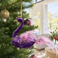 Wisteria Swan Ornament on a decorated Christmas tree