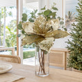 Opulent Gold Poinsettia Stem arranged in a glass vase