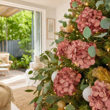 Pink Triple-Head Floral Stem on a decorated Christmas tree